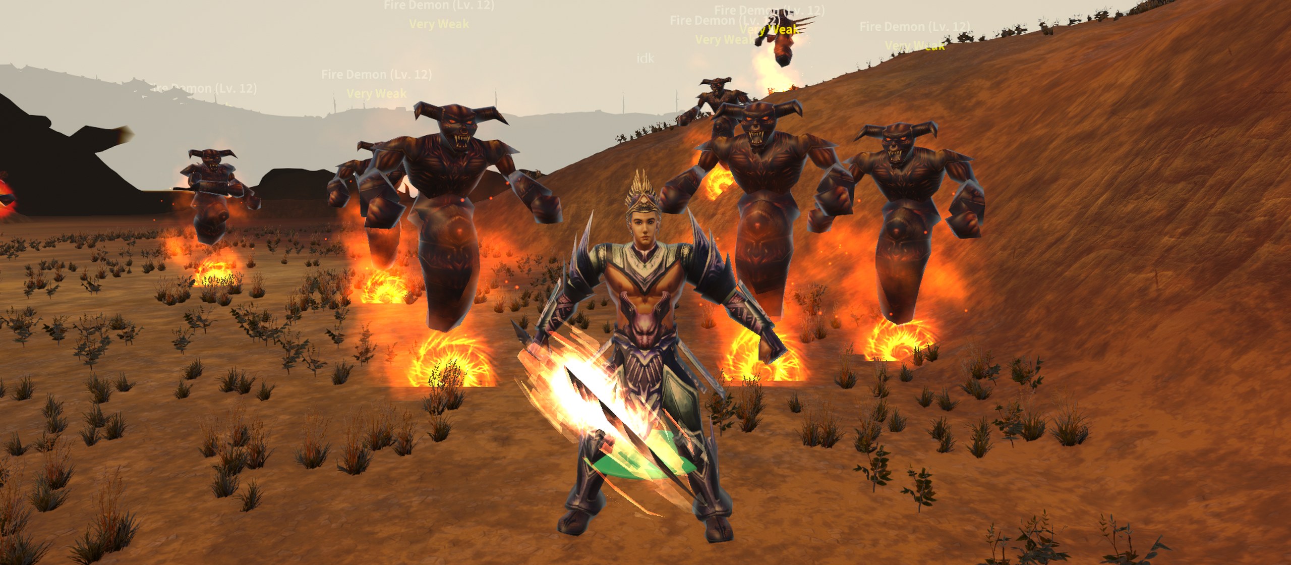 In-game view of the Desert's red hills with a swordsman and a pack of Fire Demons