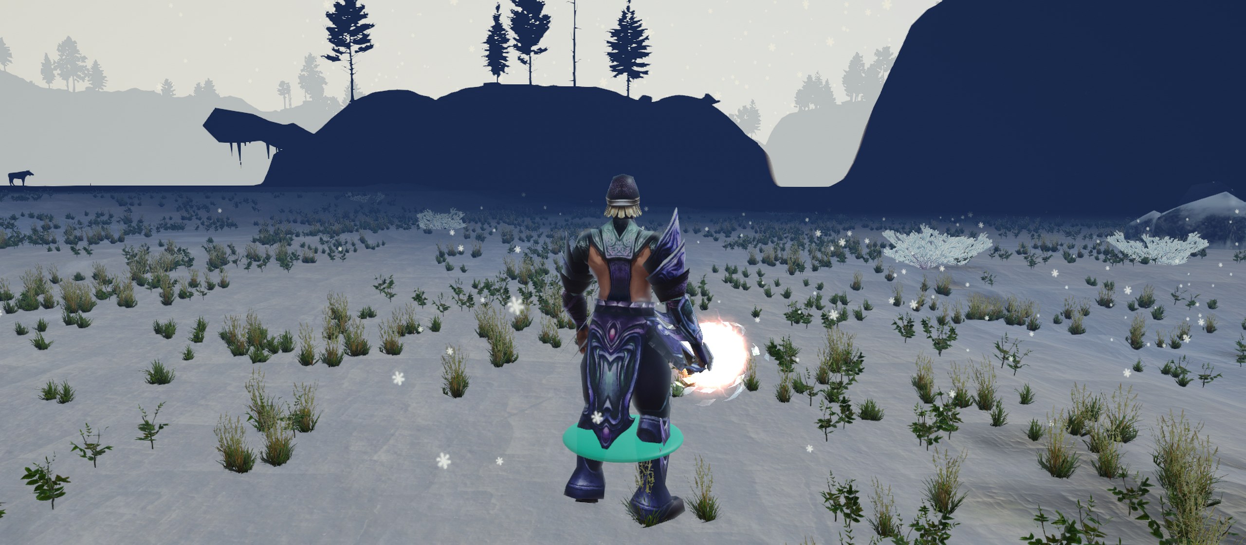In-game view of Glacier's snowfield with grass poking through, a rock arch and pines on the ridge