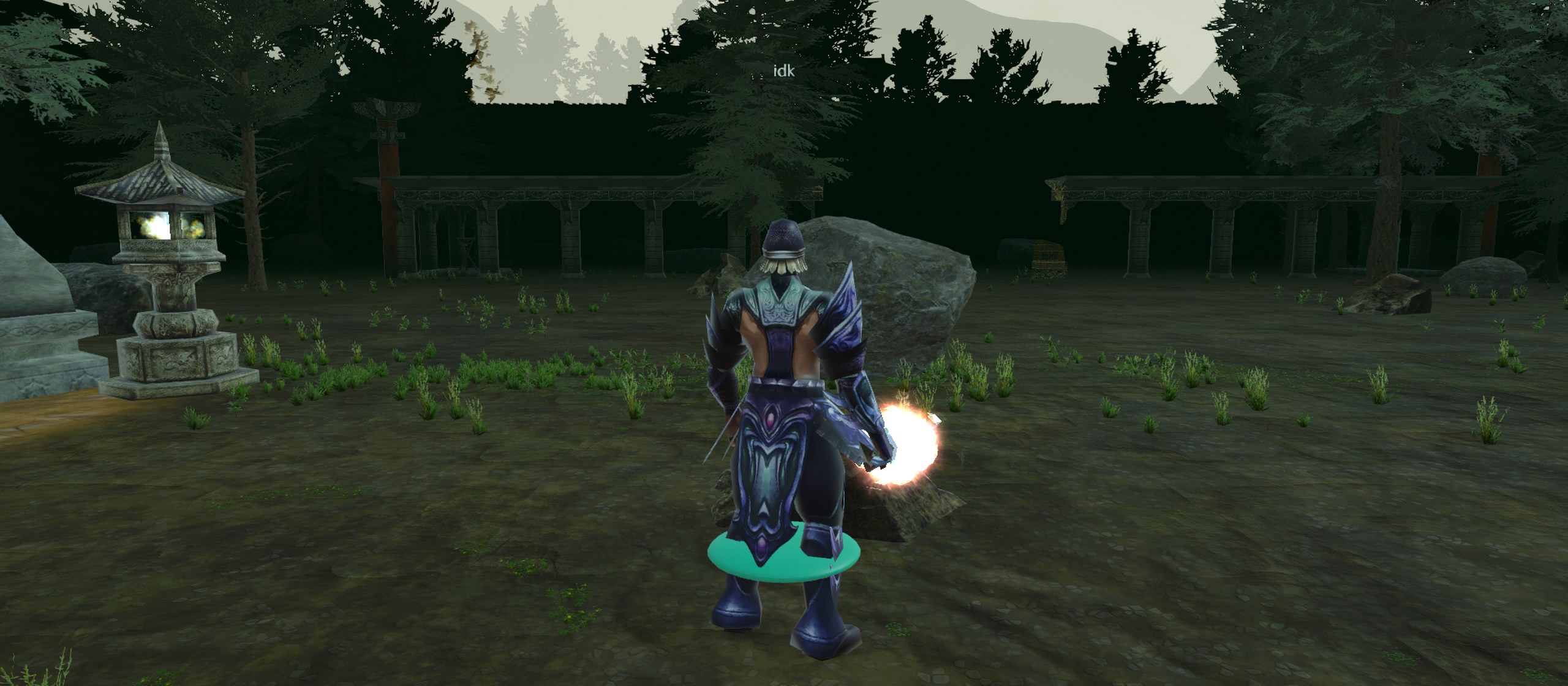 In-game view of the Guild Area courtyard with stone lanterns, pines and the old colonnade