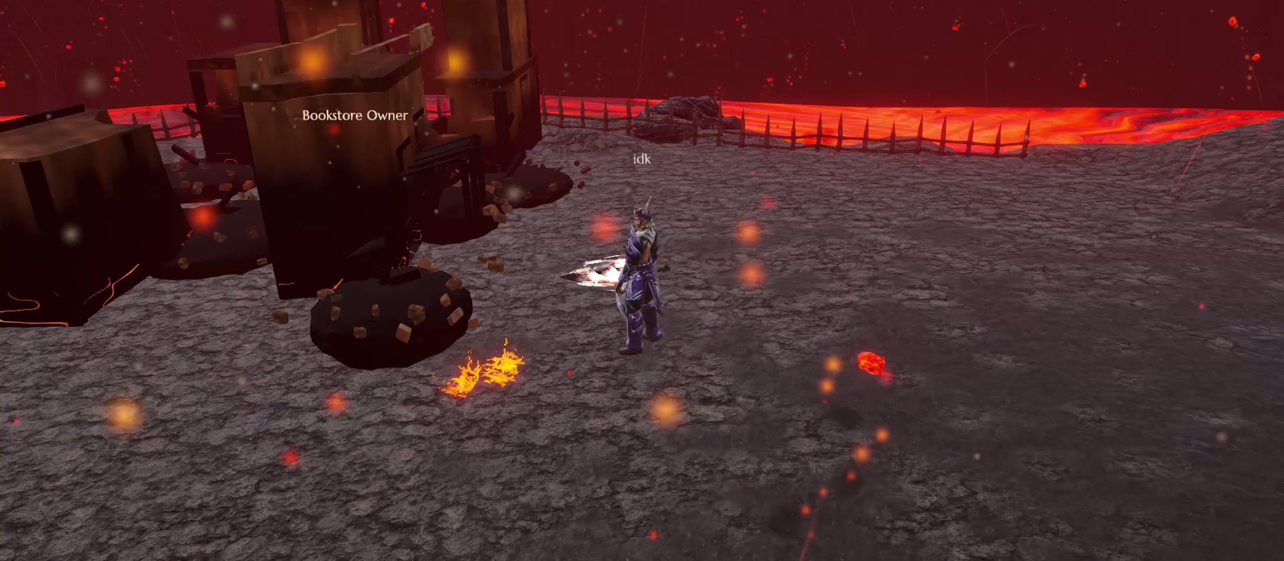 In-game view of the Volcano town: charred, collapsed adobe houses and rubble beside a river of lava